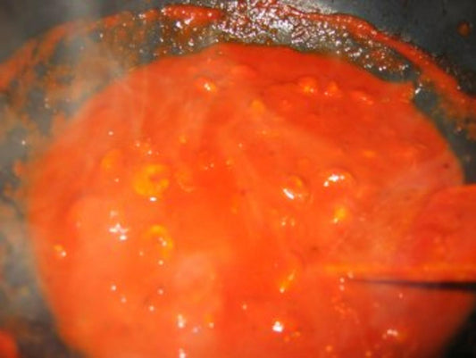 Meeresfrüchte: Krabben in Tomatensößchen
