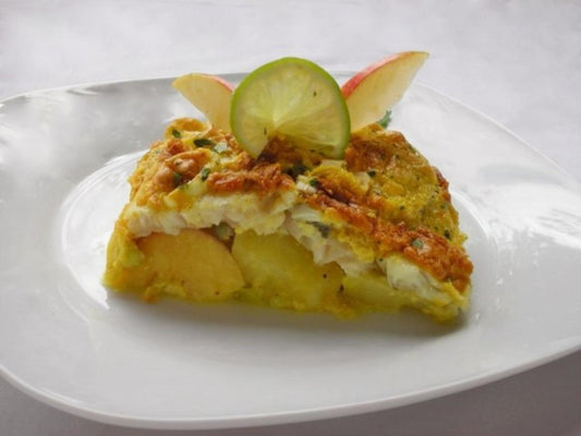 Fischfilet im Apfel Kartoffelbett mit Curryhaube