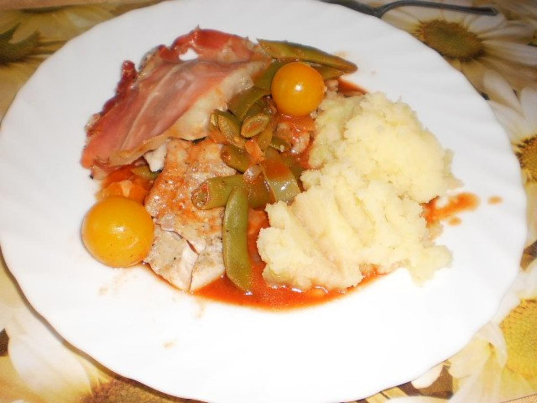 Fischfilet auf Tomaten Gemüse