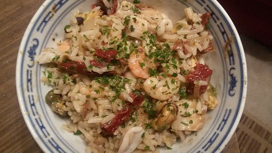Spanische Reispfanne mit Fisch und Meeresfrüchten von Archeheike